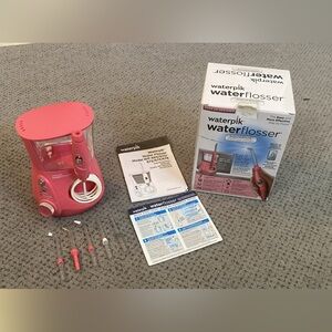 Waterpik waterflosser in pink
